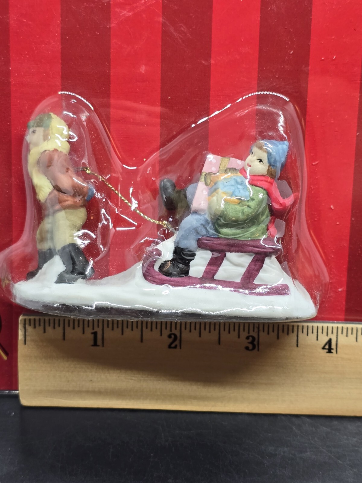 Vtg Caldor Share the Joy Village Accessorie Lady Pulling Boy On Sled With Gifts