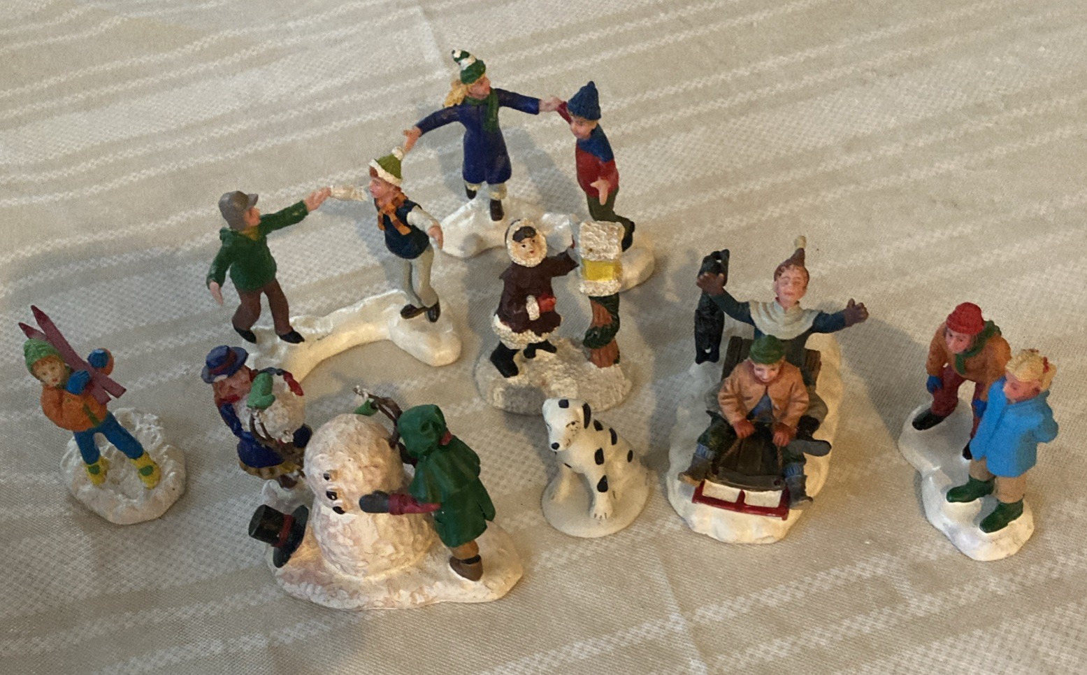 8 Pc Christmas Village Ice Skaters, Sledding, Snowman