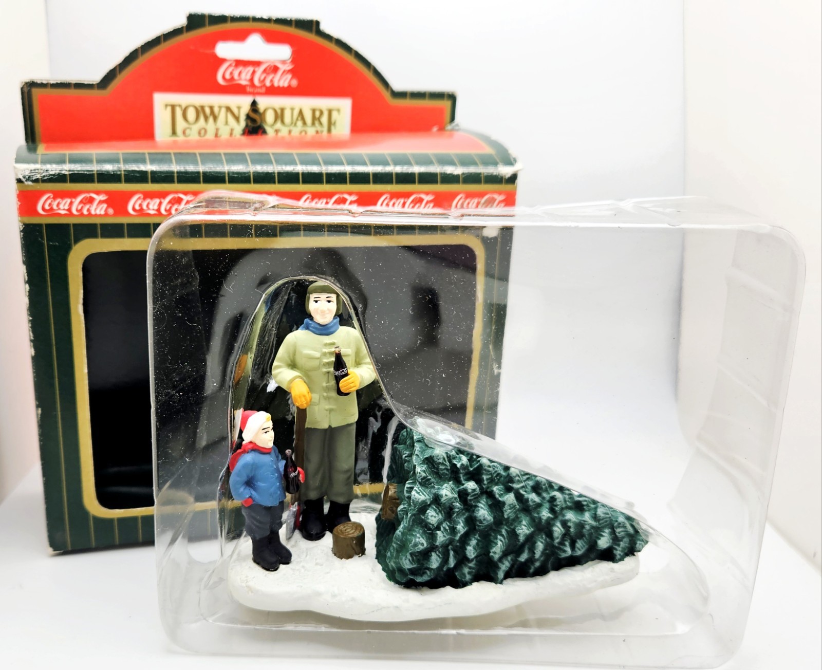 Coca-Cola Town Square Collection “Cutting the Christmas Tree” CG2409 Unused