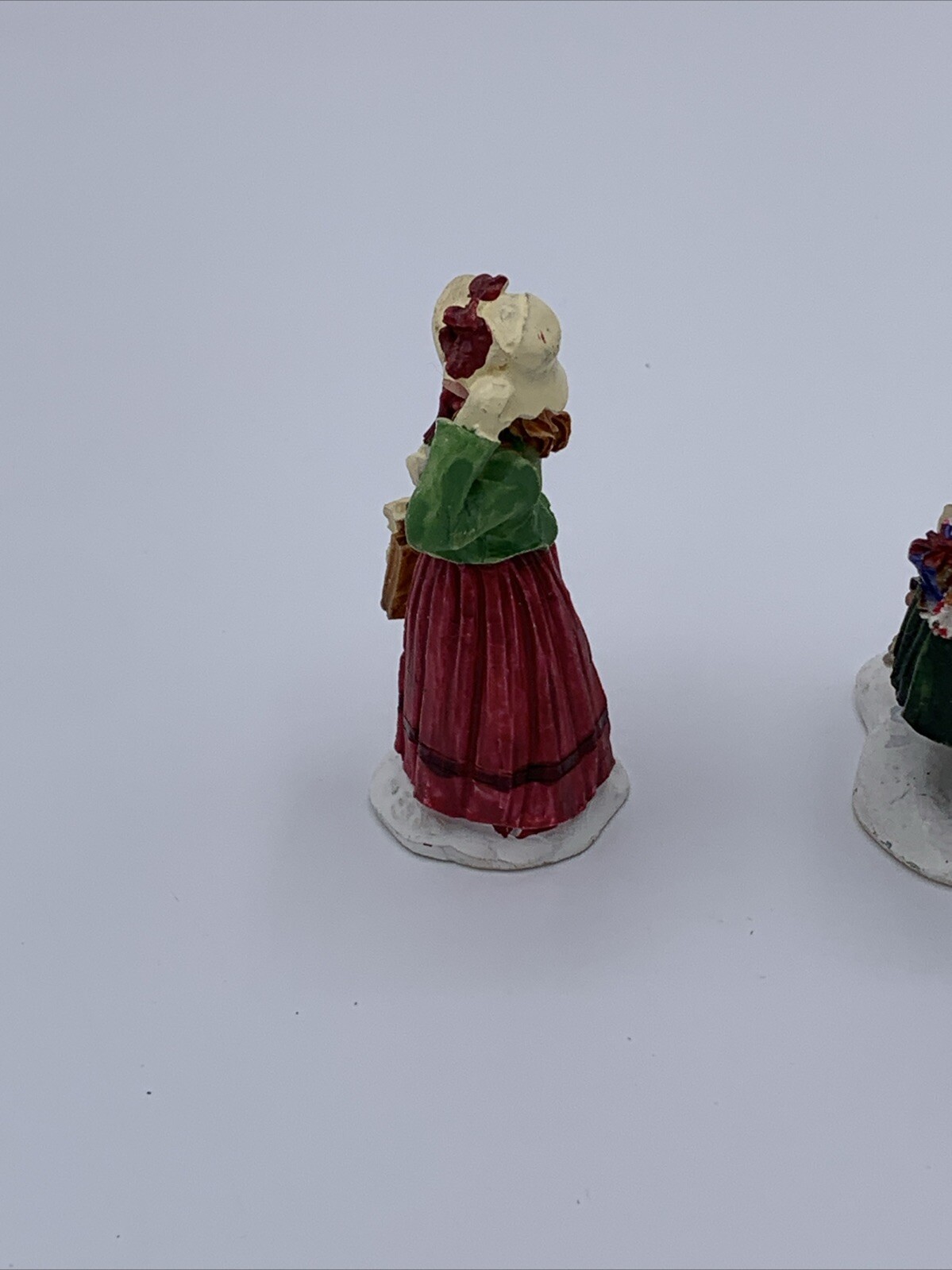 Lot of 3 Unbranded Christmas Village Figurines Tallest is 2.5 inches