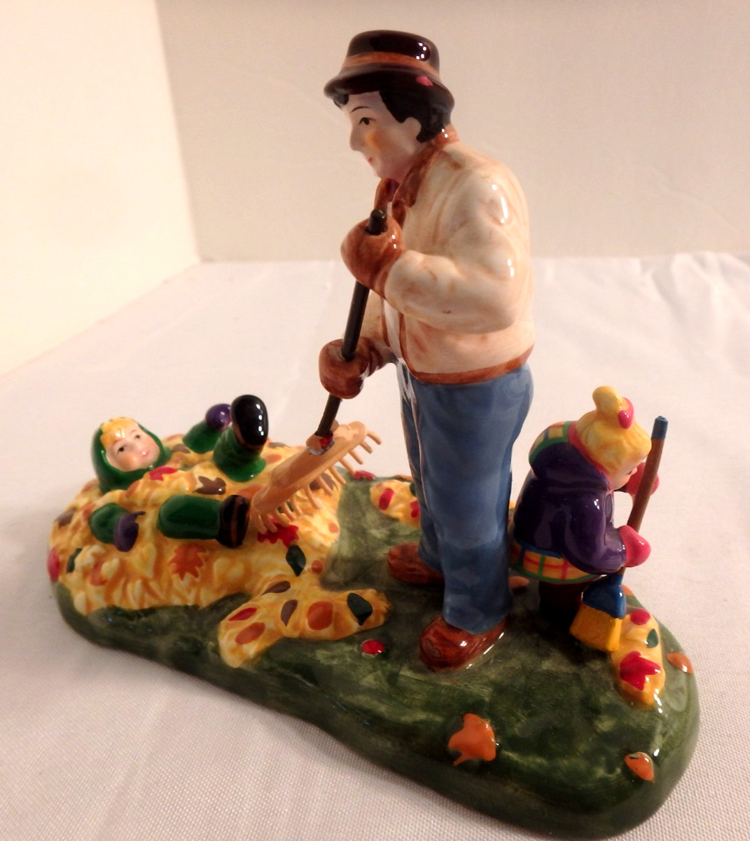 Dept 56 Preparing for Halloween #54982, Raking Leaves, Ceramic