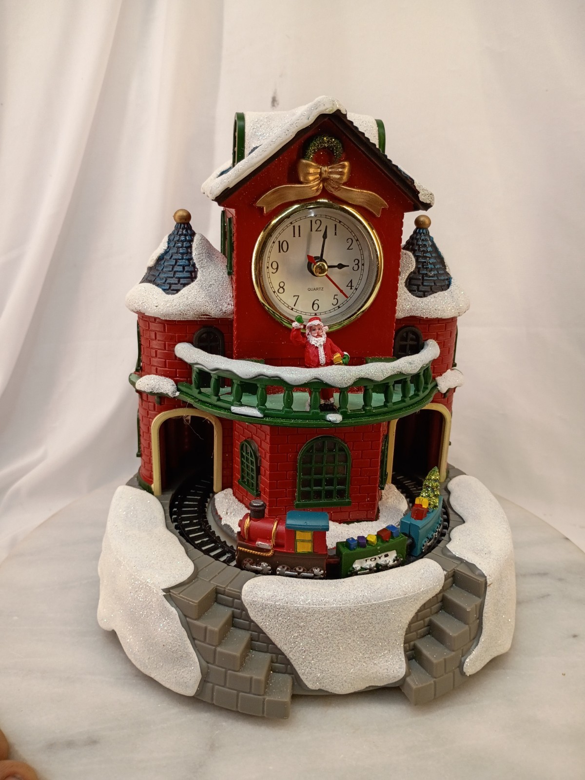 Avon 2013 Lighted Animated Christmas Village Train Station Clock Santa