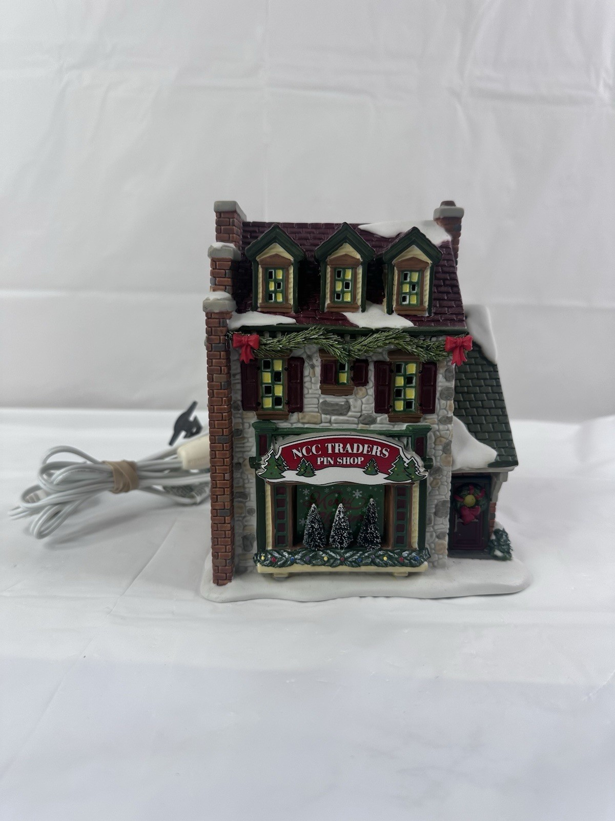 Dept 56 Christmas Holiday “NCC Traders Pin Shop” 2008