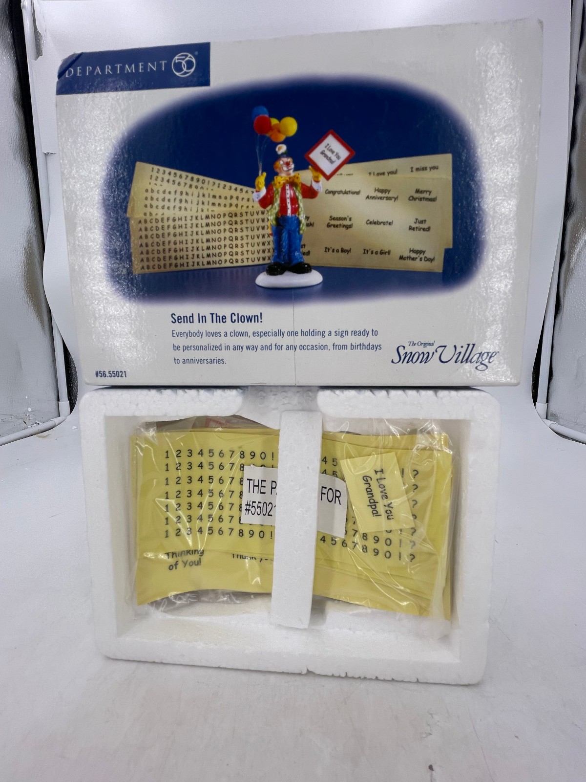 Department 56-Snow Village – Send in the Clown, with stickers (4.5″) – 55021