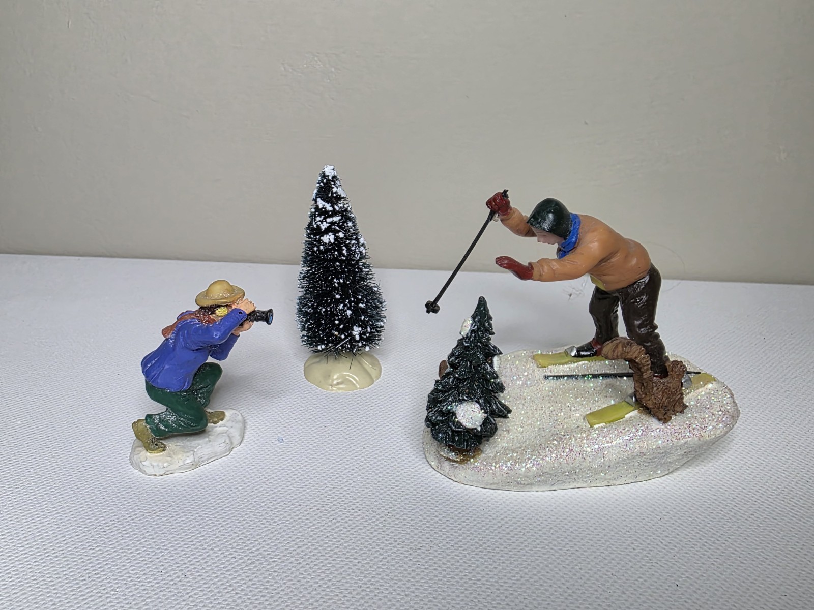 Vintage Lemax Photographer With Skier Figure Drops Ski Pole Falling Over Tree 3p
