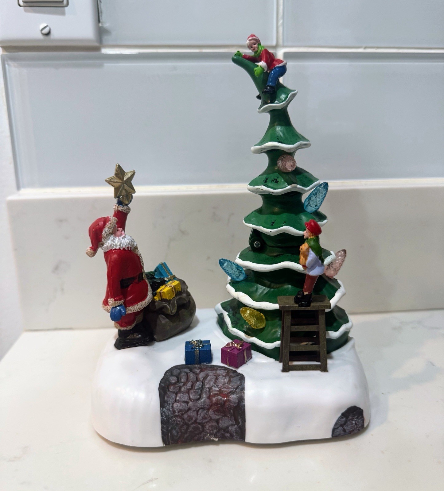 2023 Holiday time Light Up & Musical Christmas Village Decorating the Tree scene