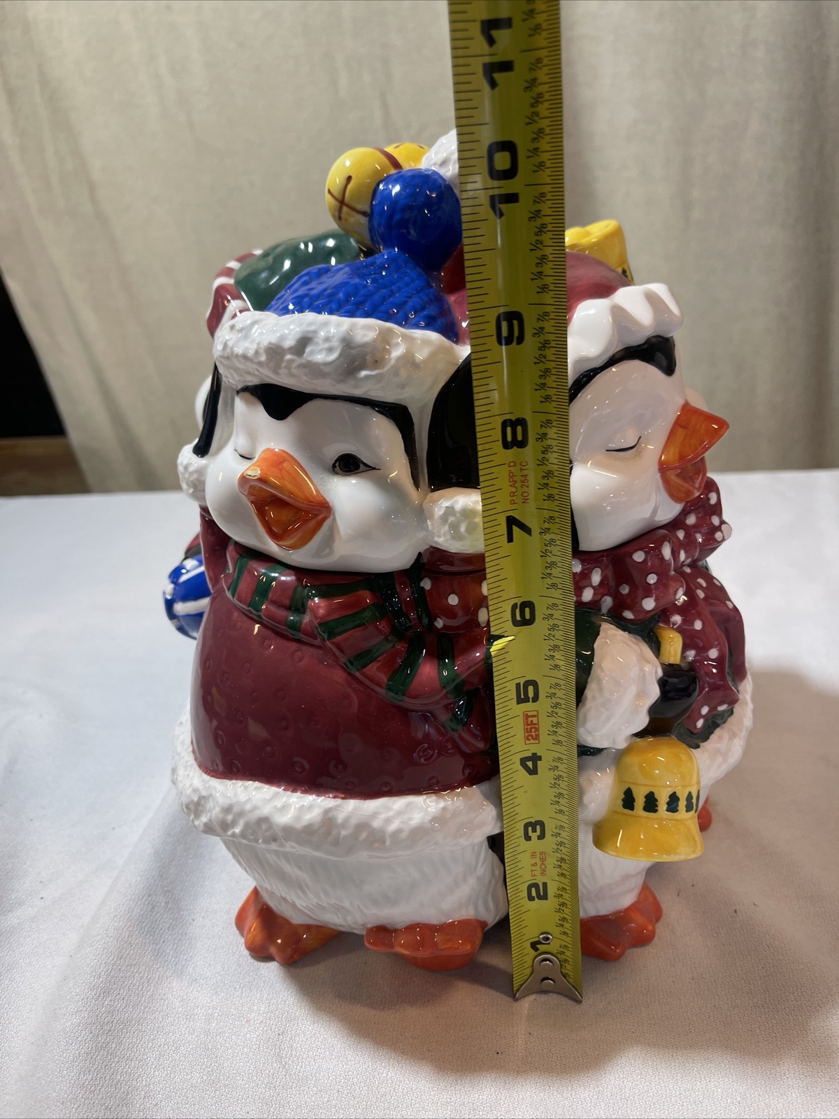 Christmas collectible 4 penguins Sold As Picture