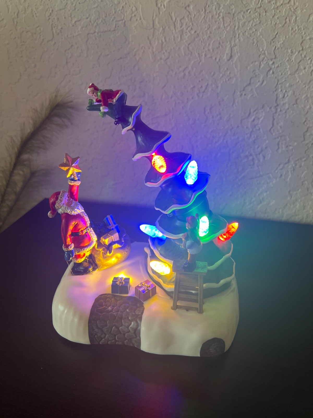 Holiday Time Light-up & Musical Christmas Village Decorating The Tree Scene 8.3″