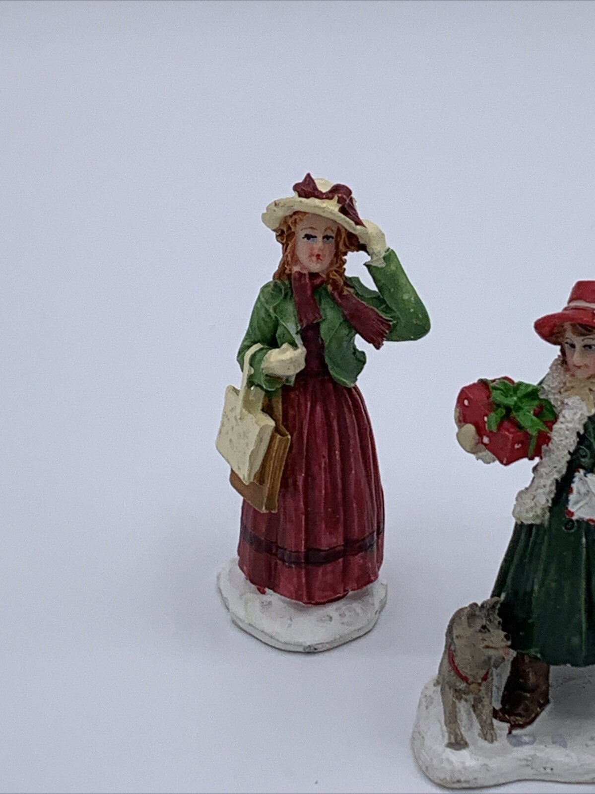 Lot of 3 Unbranded Christmas Village Figurines Tallest is 2.5 inches