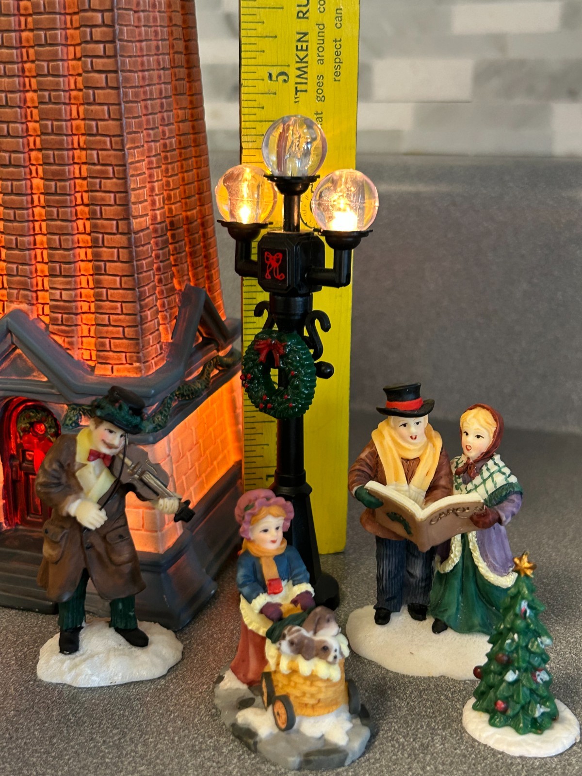 Christmas Village Lighted Church w Carolers, Violin Player & Girl w Buggy, 7 Pcs