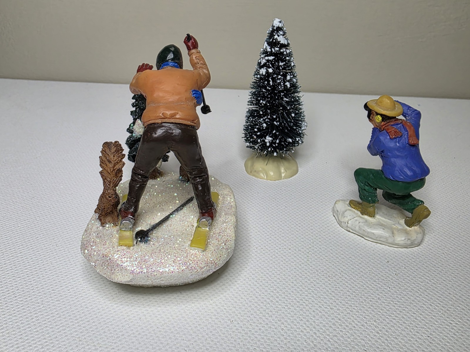 Vintage Lemax Photographer With Skier Figure Drops Ski Pole Falling Over Tree 3p