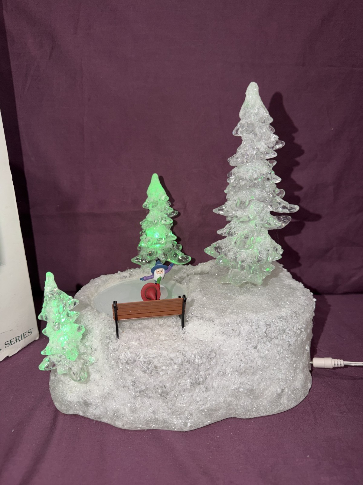 Department 56 Animated “Ice & Snow Skating Pond” Skater Bench