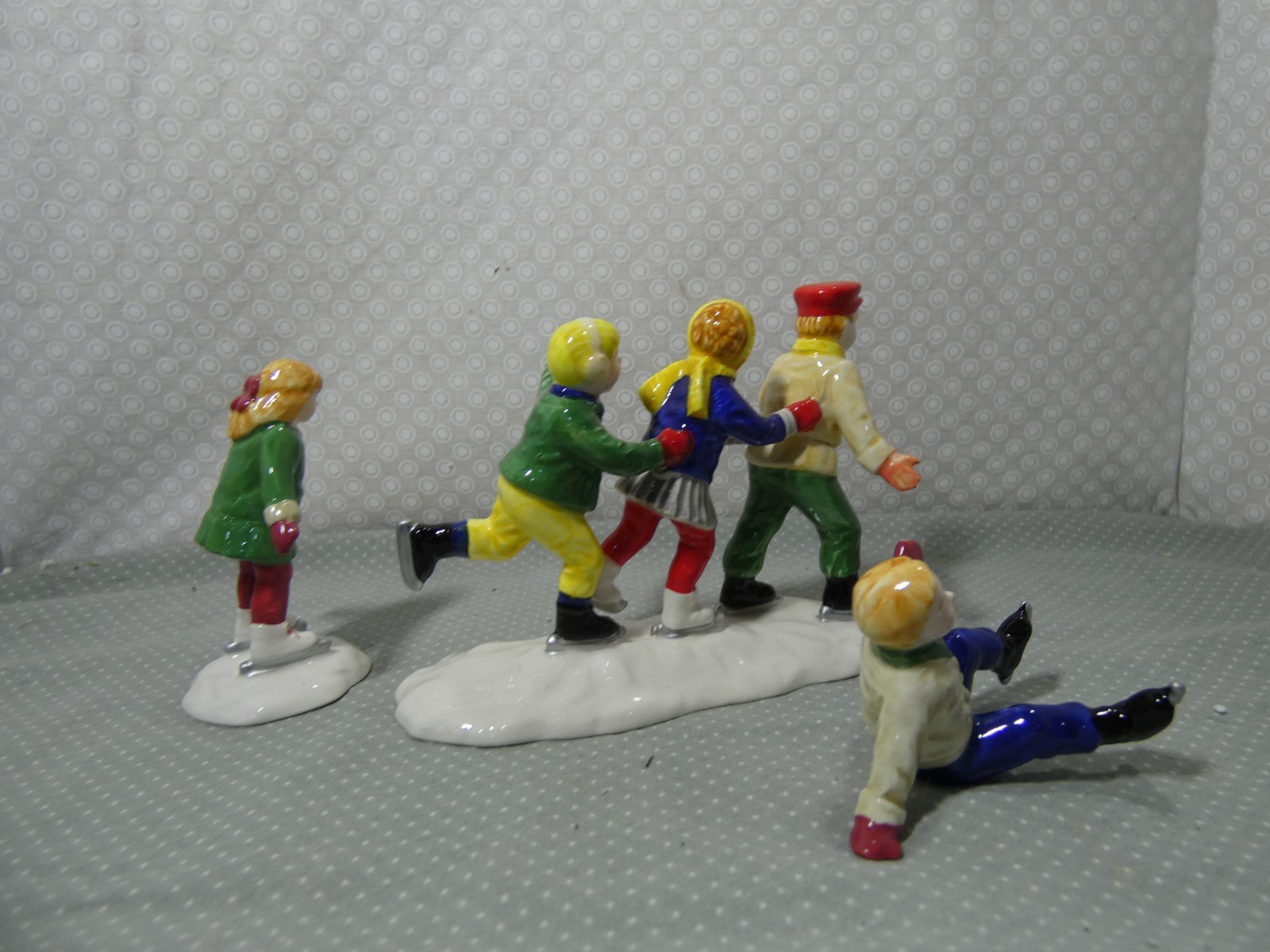 Department 56 “Crack The Whip Skaters” (Set of 3) #5171-3 – Snow Village