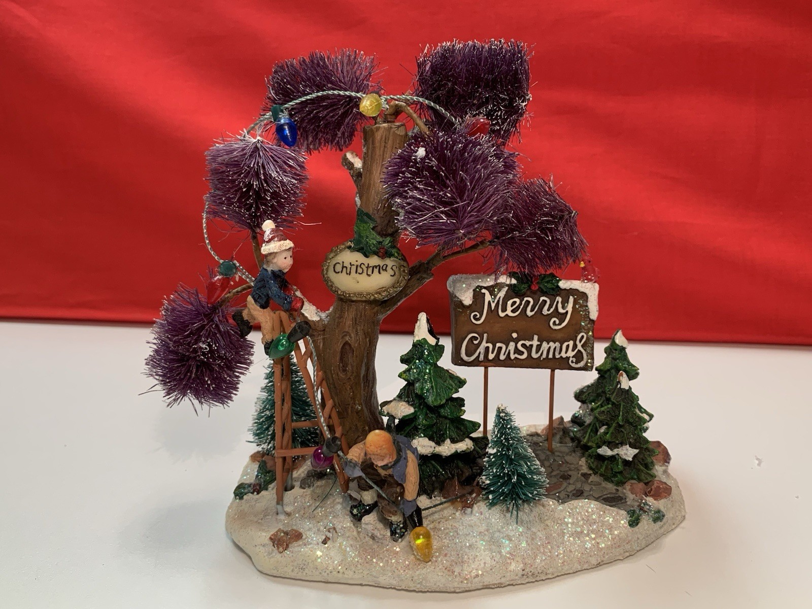 Merry Christmas Decorating The Tree With Lights Christmas Village Figurine 5.5″