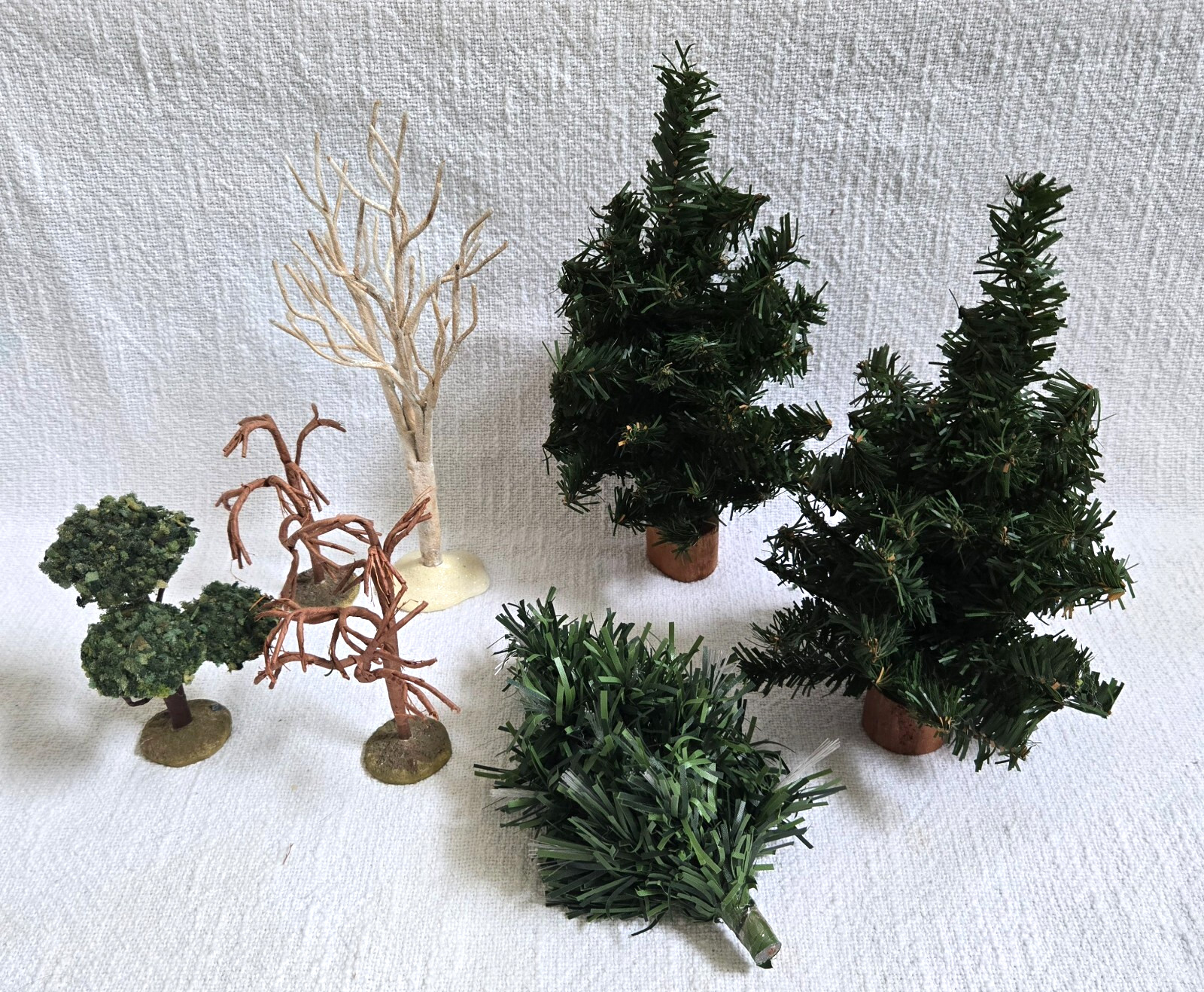 Lot of 7 Assorted Xmas Village Trees Spruce Pines Bendable Wood Base 3 Leafless