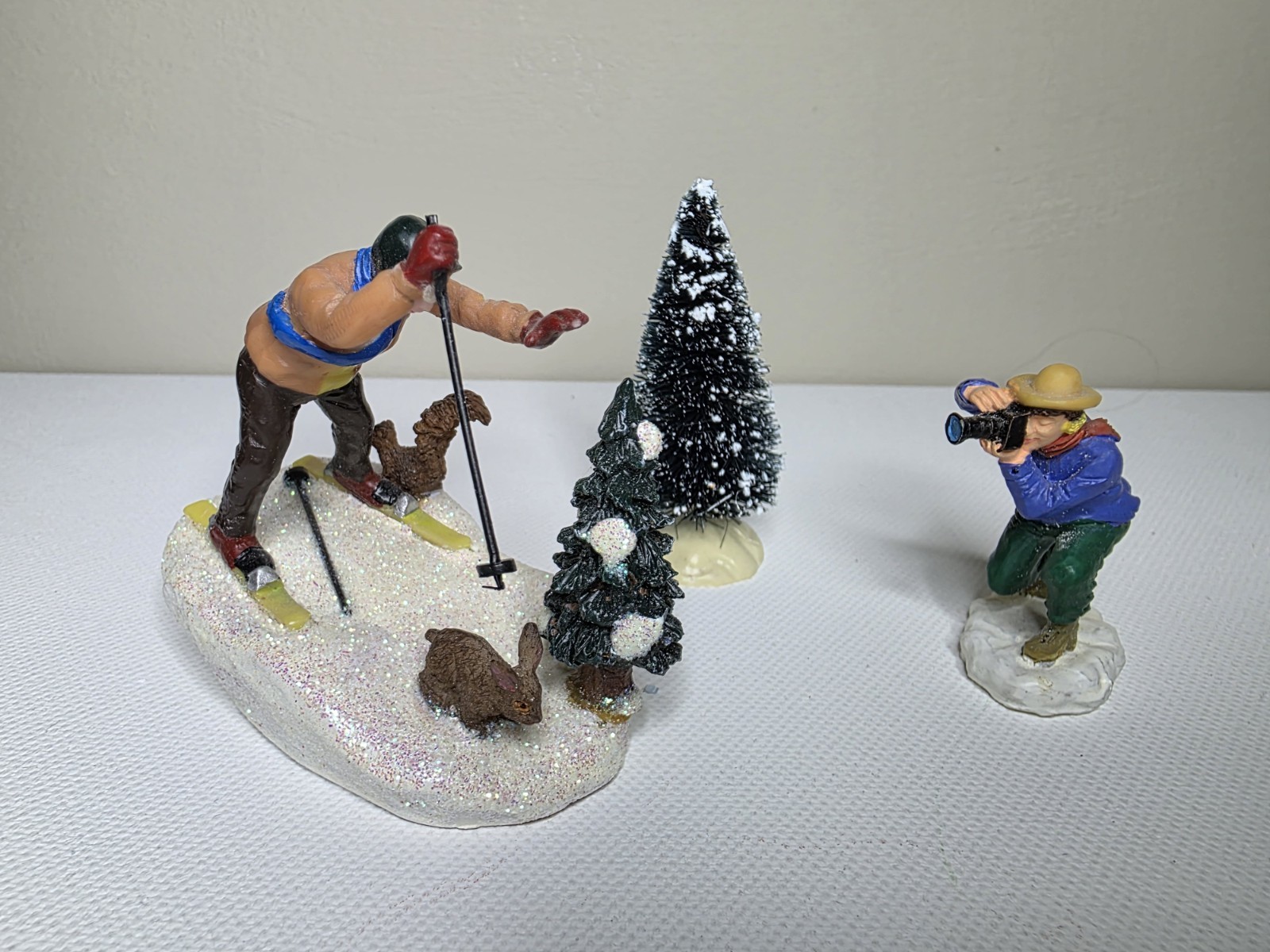 Vintage Lemax Photographer With Skier Figure Drops Ski Pole Falling Over Tree 3p