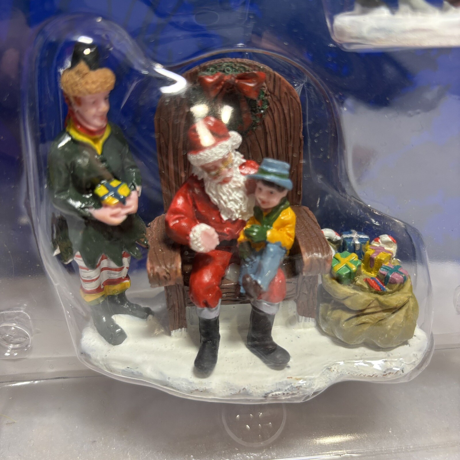 Lemax SITTING ON SANTA’S LAP #62276 – NEW – Perfect for a Christmas Village