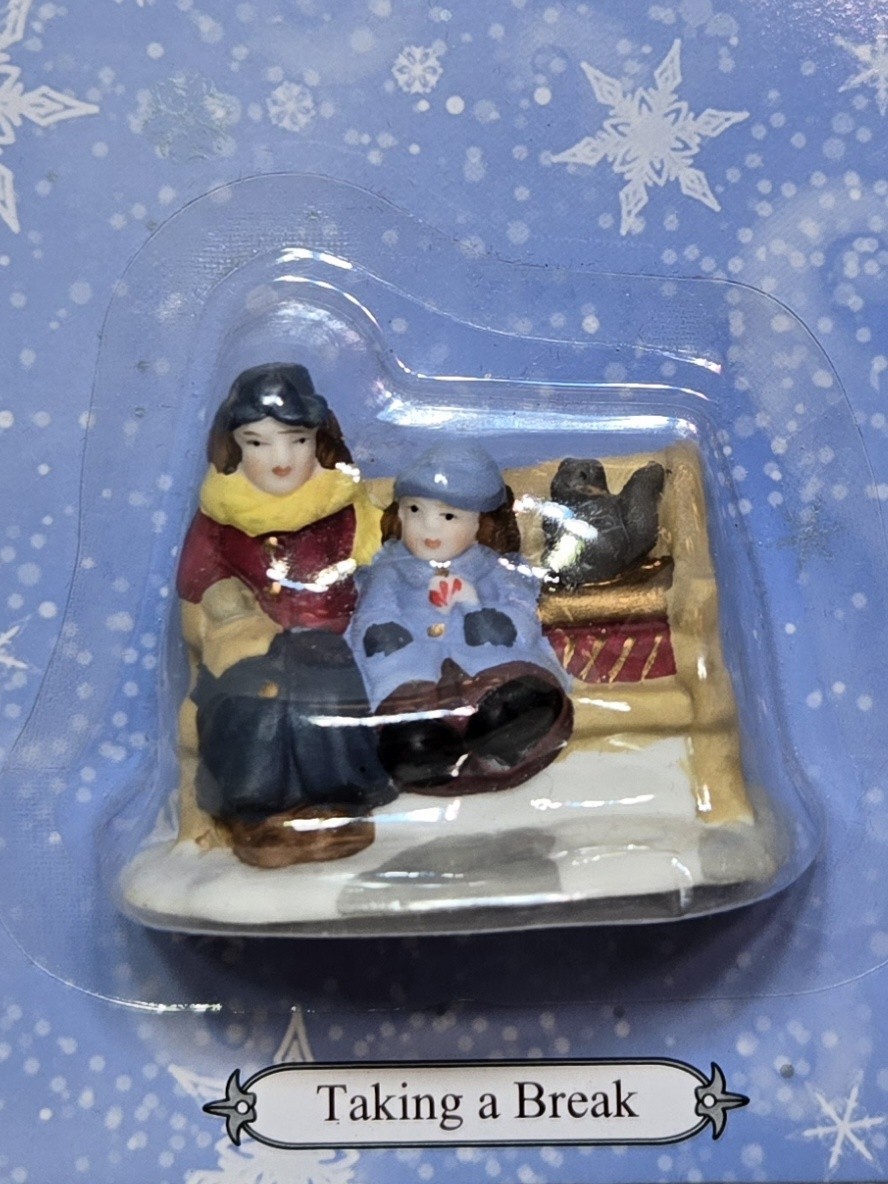 Hershey’s Holiday Village-3 Pieces-Train Porter, Taking a Break, and Packages