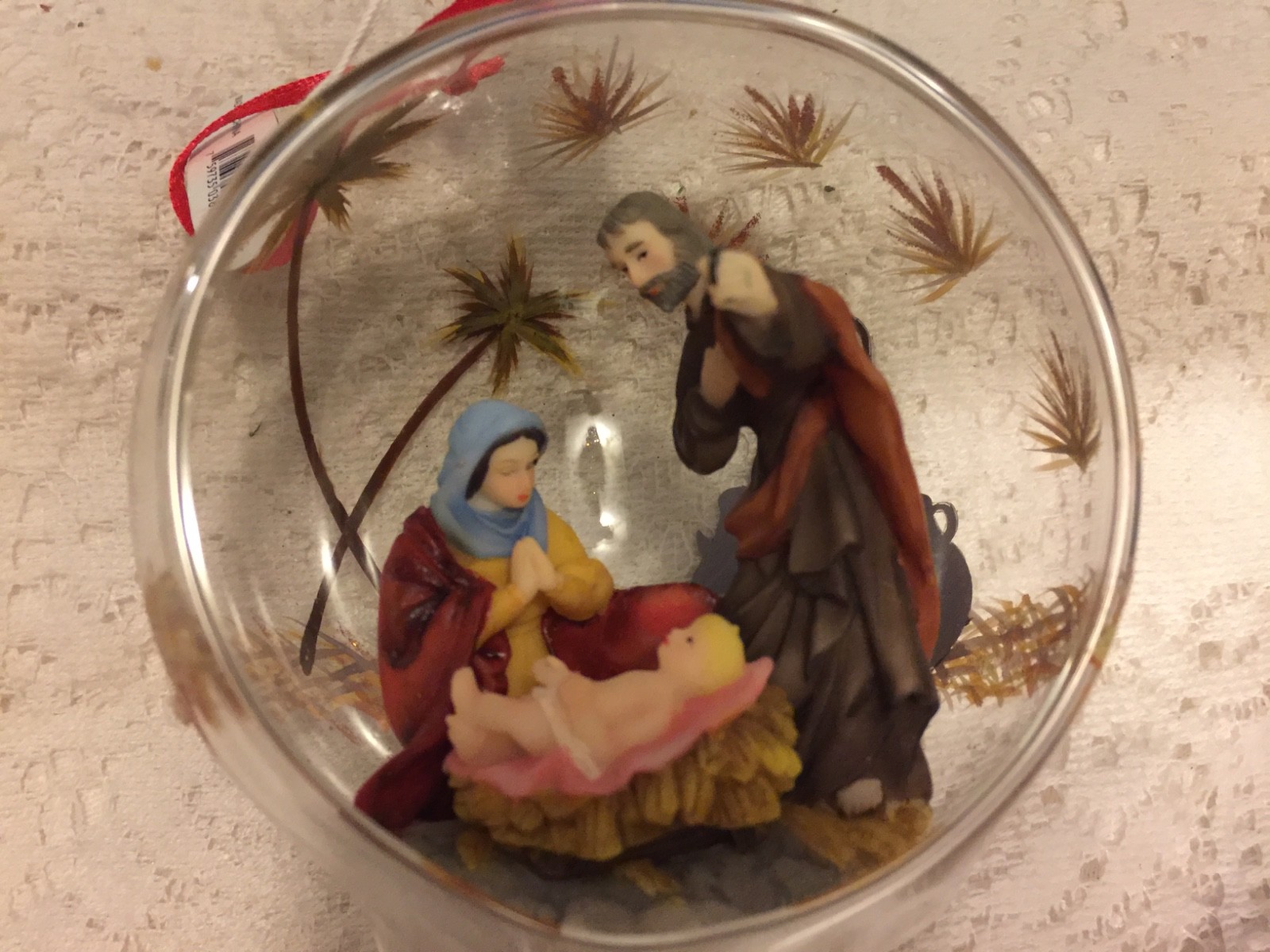 Celebrations 2001 O’Well Holy family inside blown glass ornament