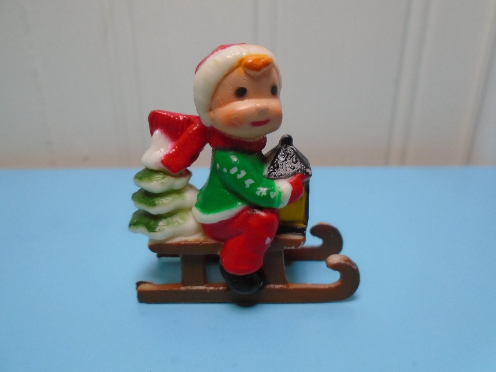 VINTAGE HAND PAINTED PLASTIC BOY ON SLED 1.5″ FIGURE CAKE TOPPER (SF456)