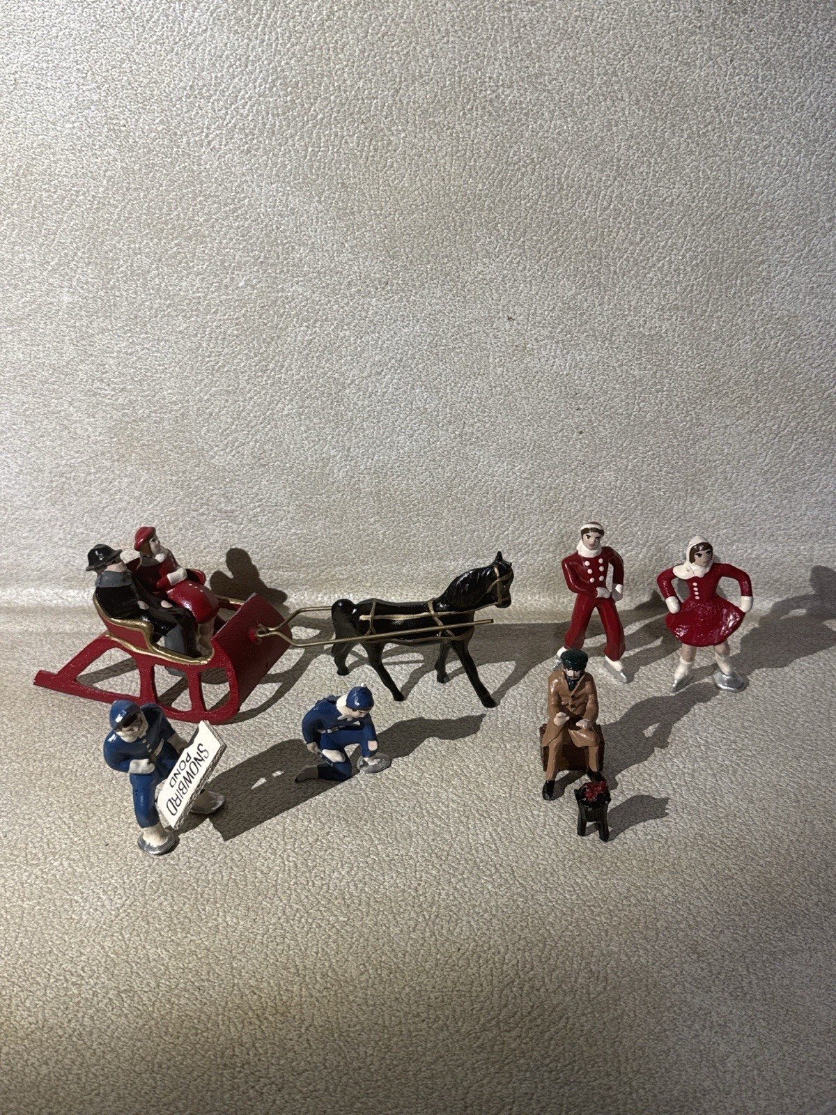 Cast Iron Christmas Village Figure Lot–Horse Sleigh, Skaters Ski& Bonfire Scene