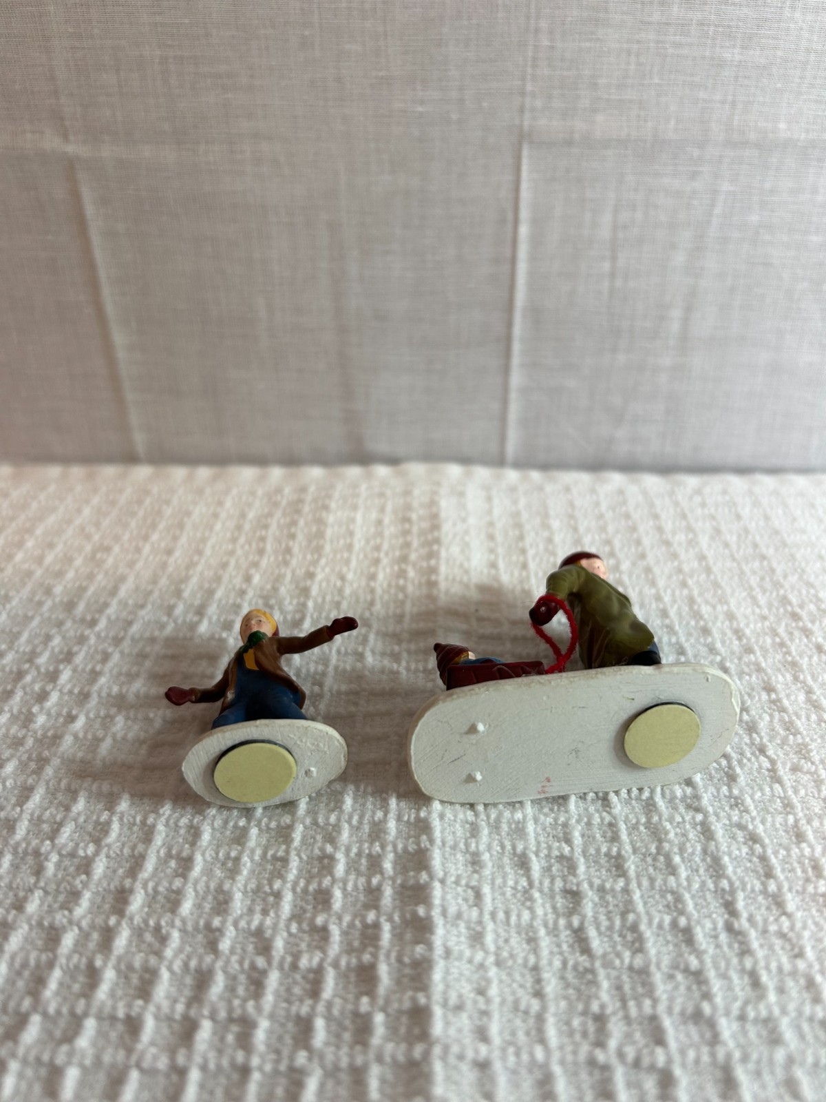 DEPT 56 FIGURES SET OF 2 ALL AROUND THE PARK SINGLE BOY, MAN & BOY IN SLED