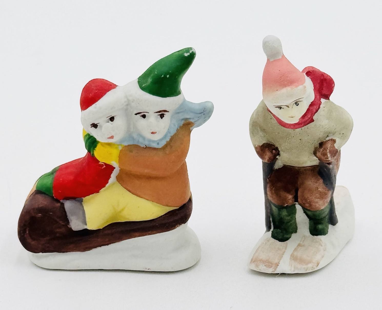 6 Christmas Village Figures Ceramic Skiing Sledding Towns People Kids Flaw