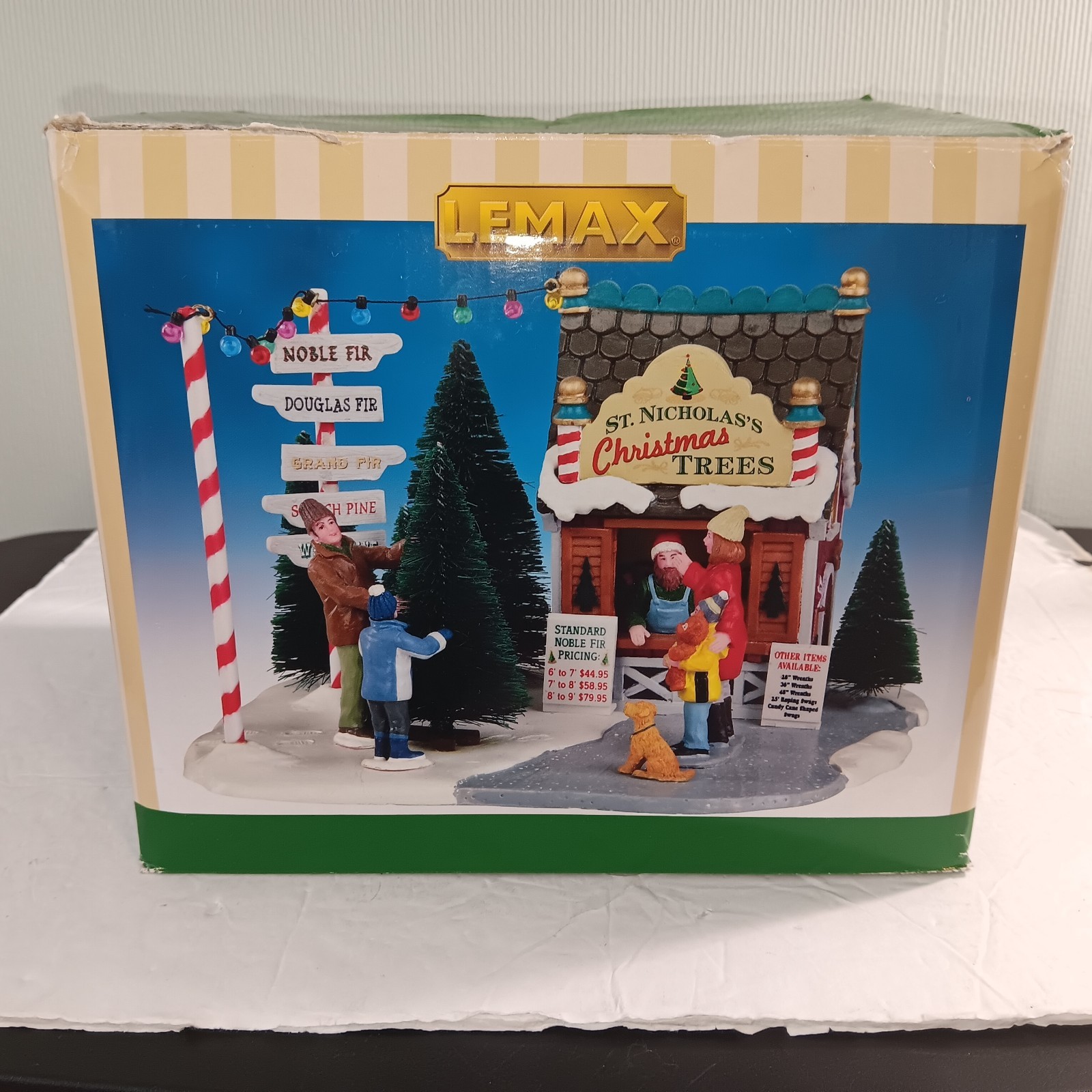 LEMAX St. Nicholas’s Tree Lot 3D Village Family Christmas Scene
