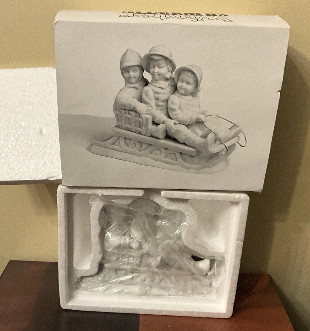 DEPT 56 Christmas Winter White Silhouette Boy Sled Sliding In The Snow Figurine