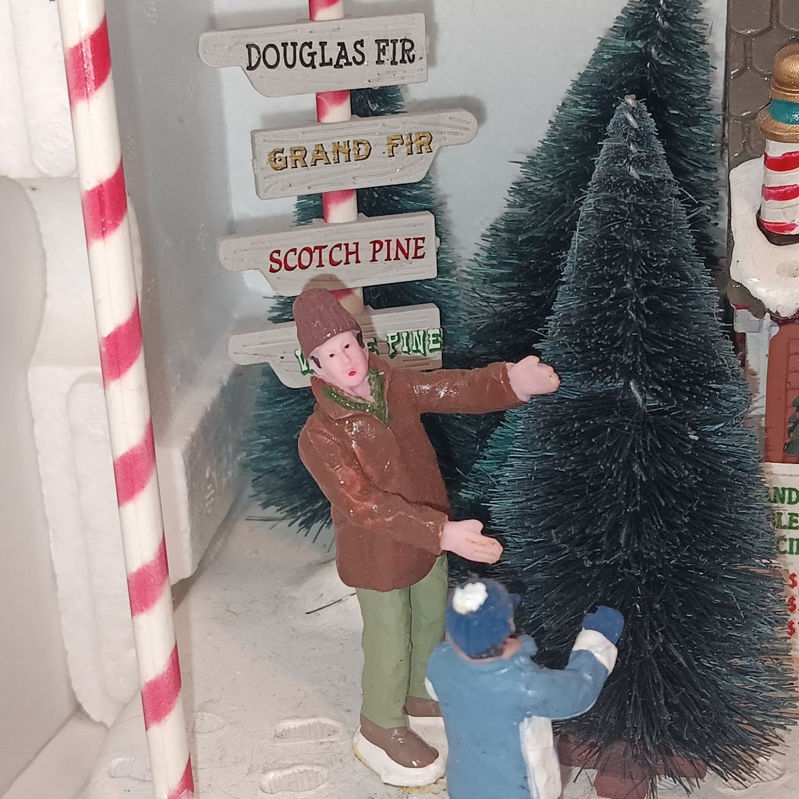 LEMAX St. Nicholas’s Tree Lot 3D Village Family Christmas Scene