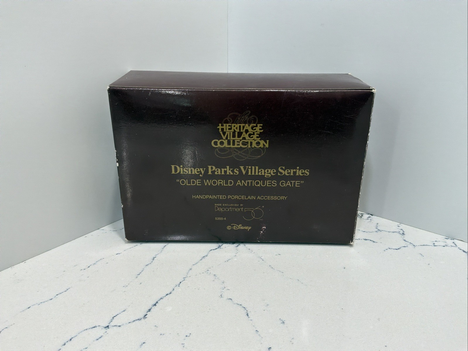 Department 56 Disney Parks Village Series ‘Olde World Antiques Gate’ #691