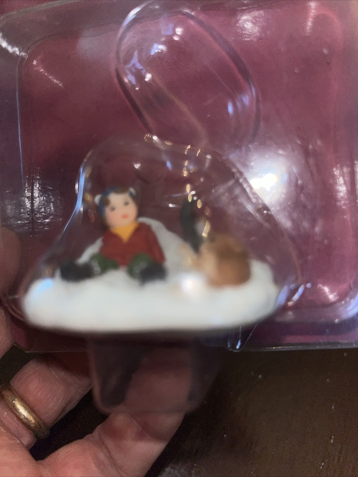 Holiday Time Village Collectables Child Sitting in the Snow with Sled and Dog