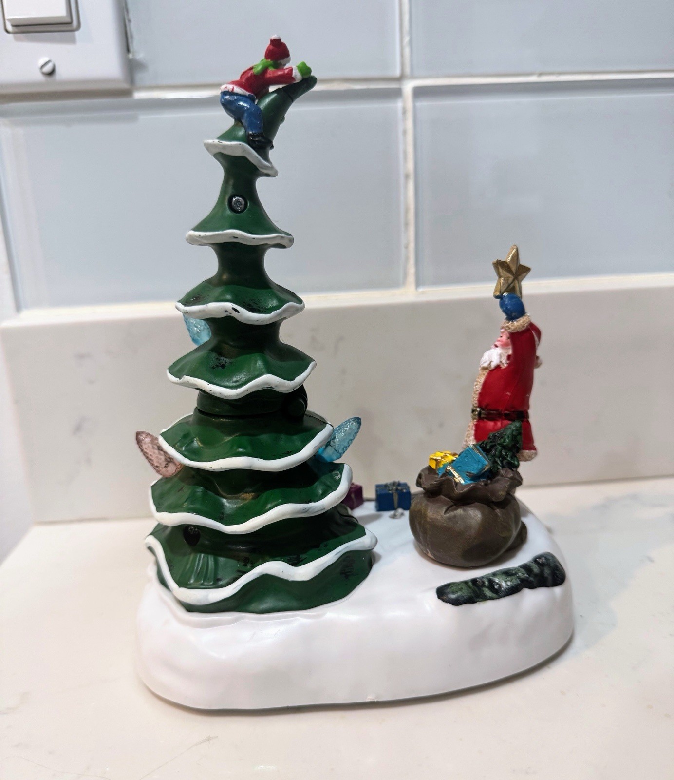 2023 Holiday time Light Up & Musical Christmas Village Decorating the Tree scene