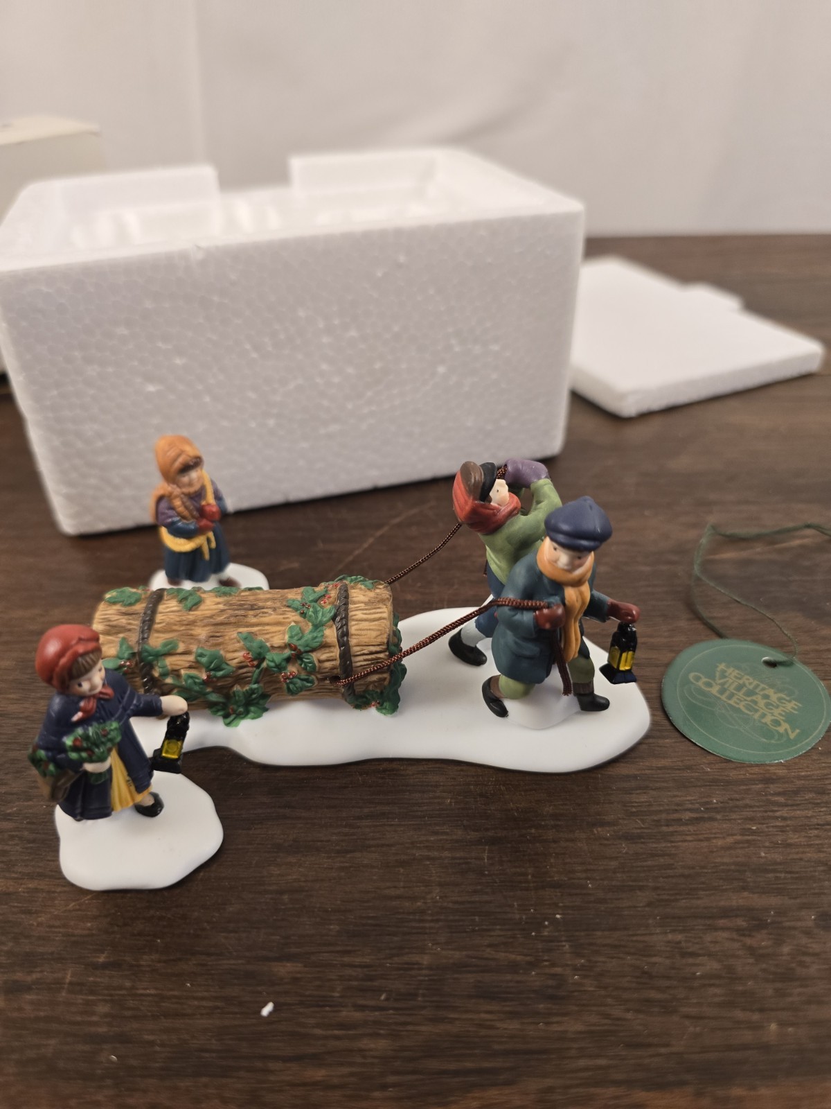 NIB Dept 56 The Heritage Village Collection “Bringing The Yule Log” Figurines