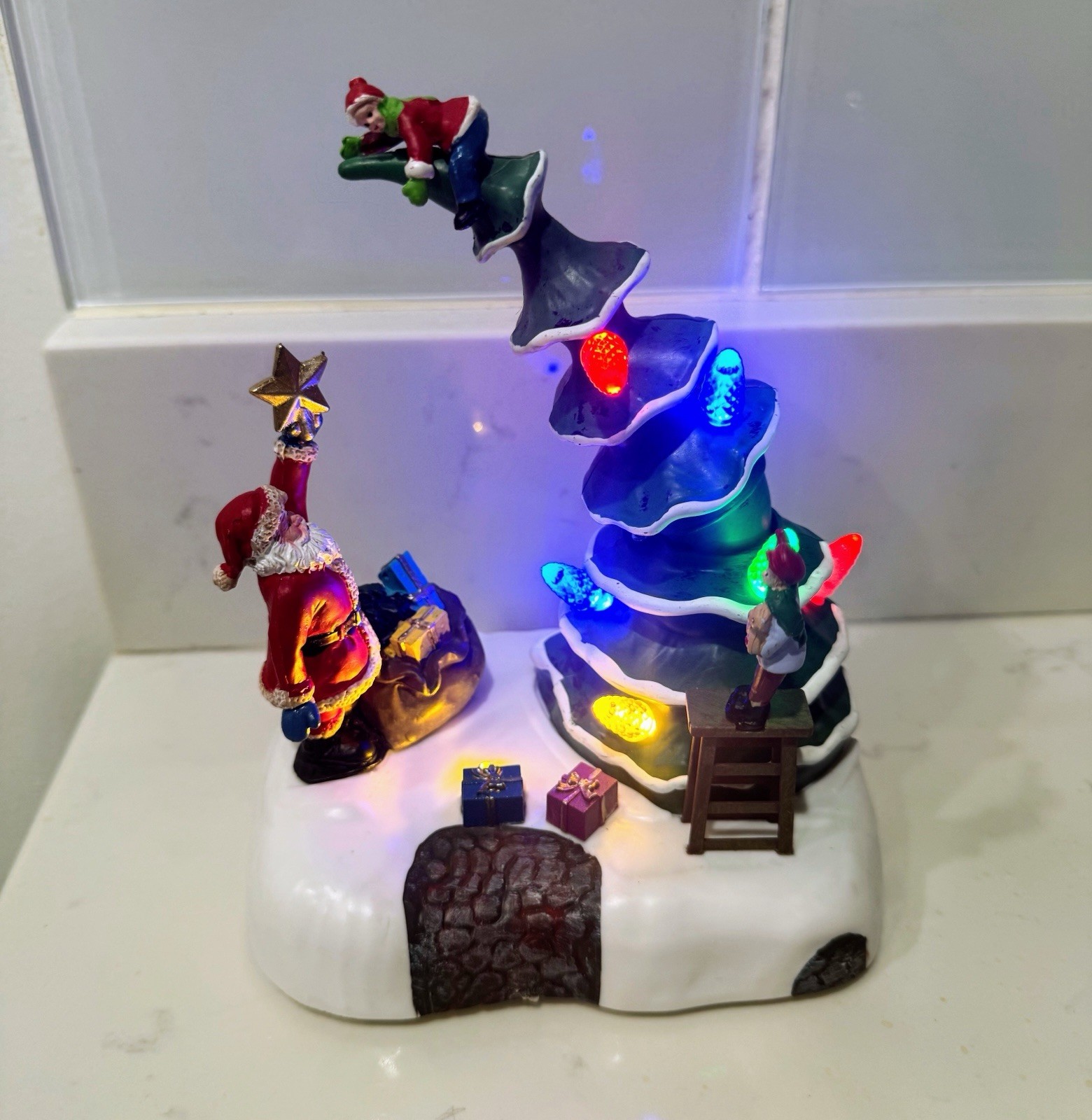 2023 Holiday time Light Up & Musical Christmas Village Decorating the Tree scene