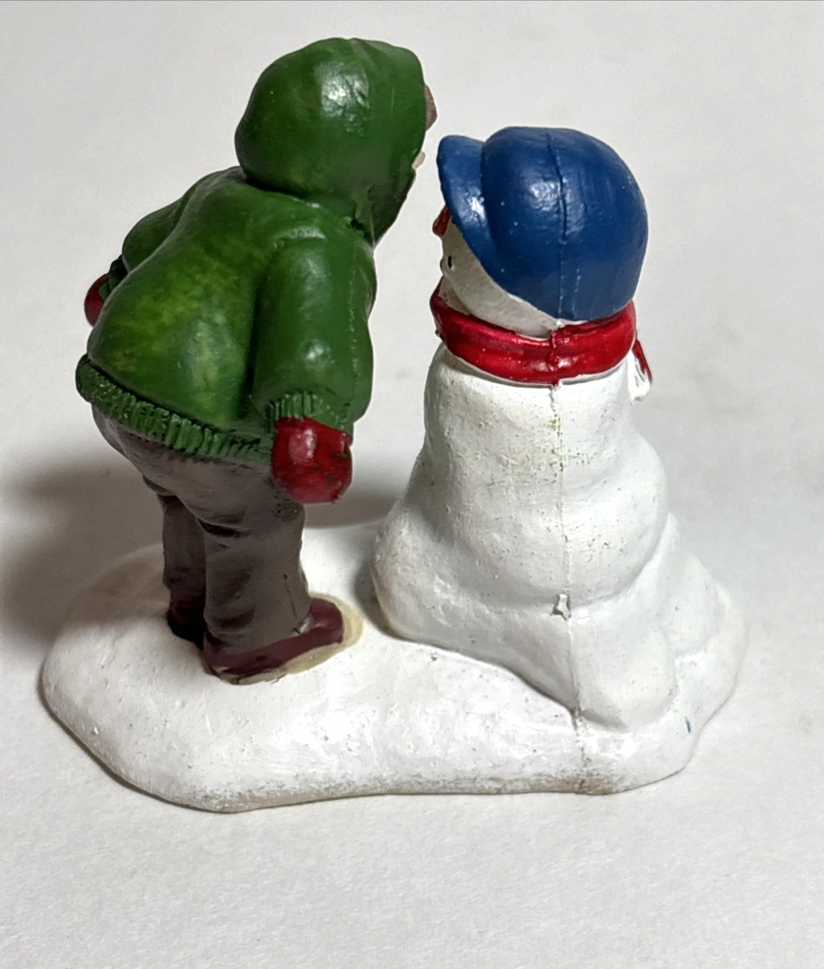 2 Christmas Village Figurines, Resin Figures on Snow Bases, approx 2.5 in high