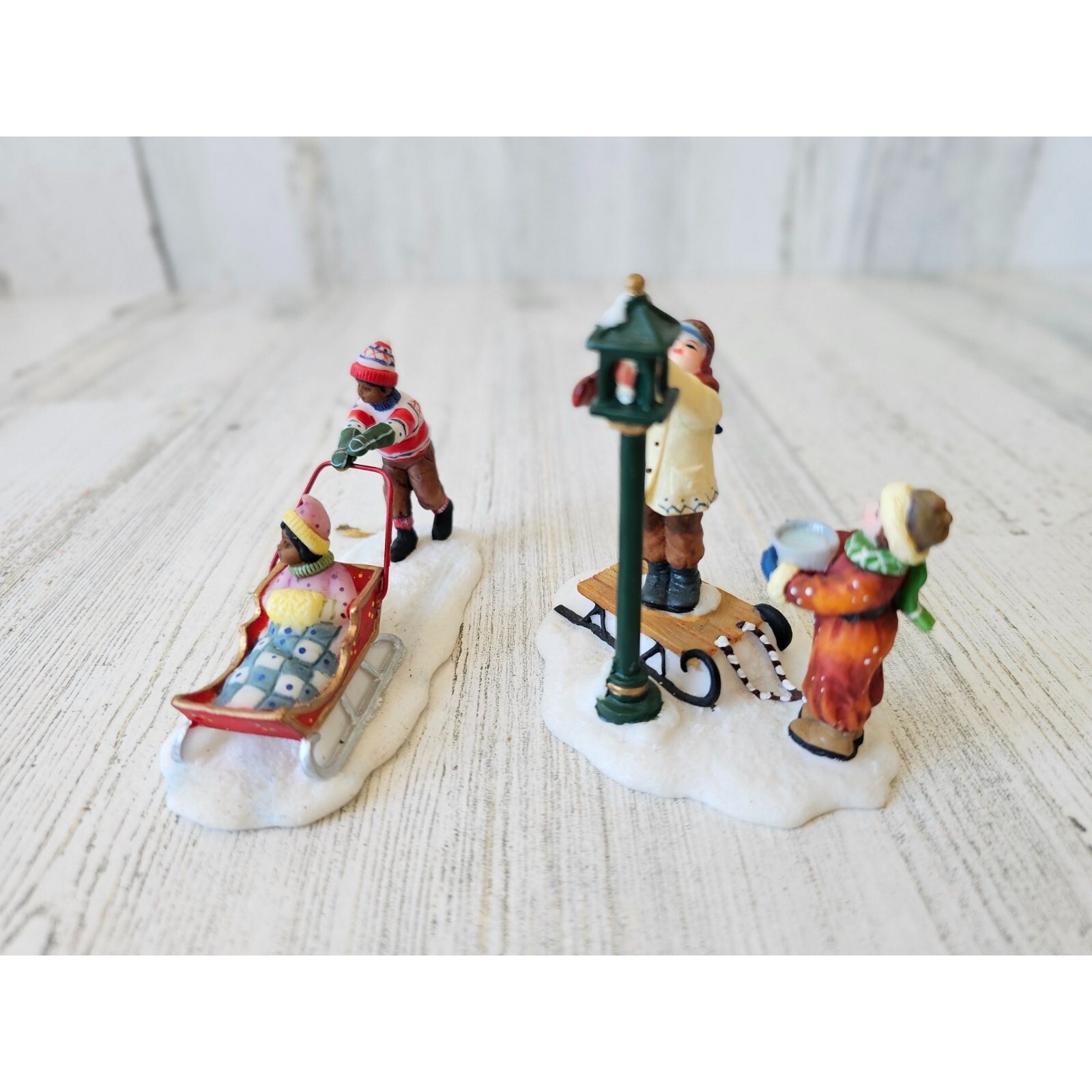 People sledding light children village Xmas accessory The one with the lamp