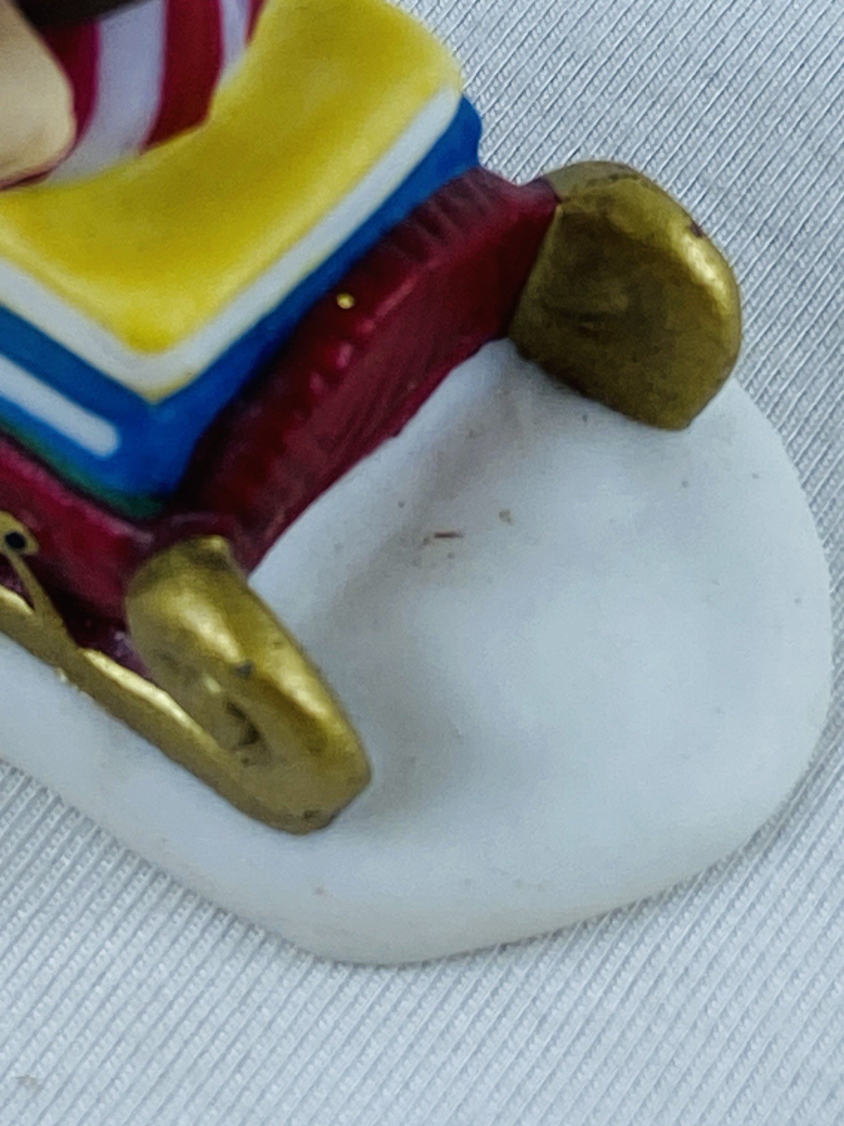 Department 56 H.V. Series Santa Claus In Red & White Striped Pajamas On A Sled