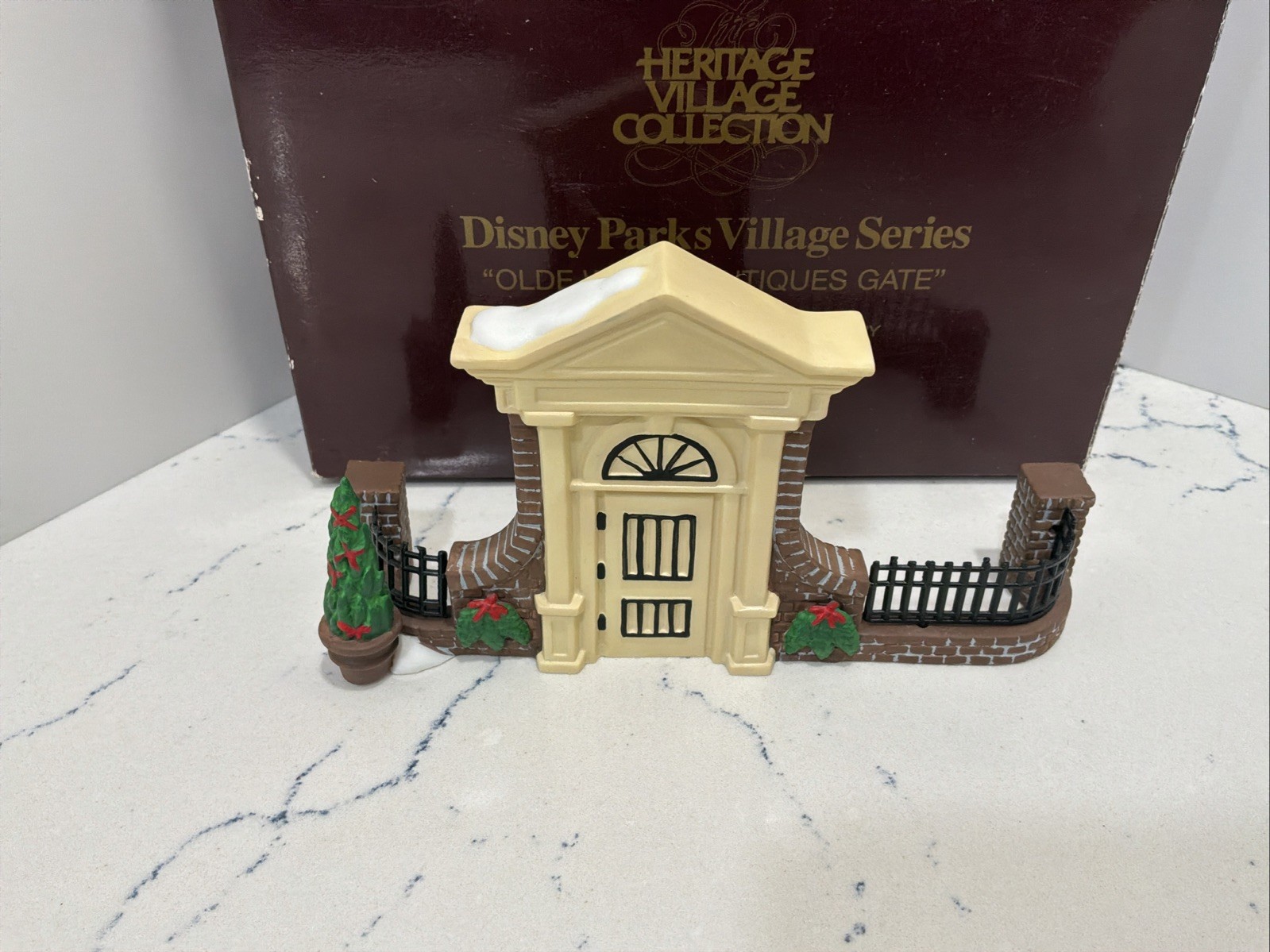 Department 56 Disney Parks Village Series ‘Olde World Antiques Gate’ #691