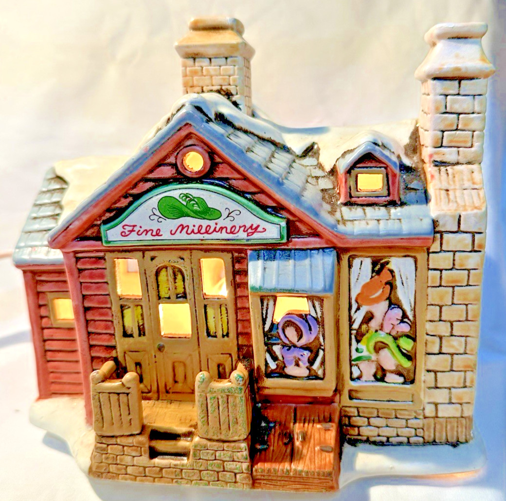 1988 Lefton Colonial Village Fine Millinery Dress Clothing Store by Byron Wood