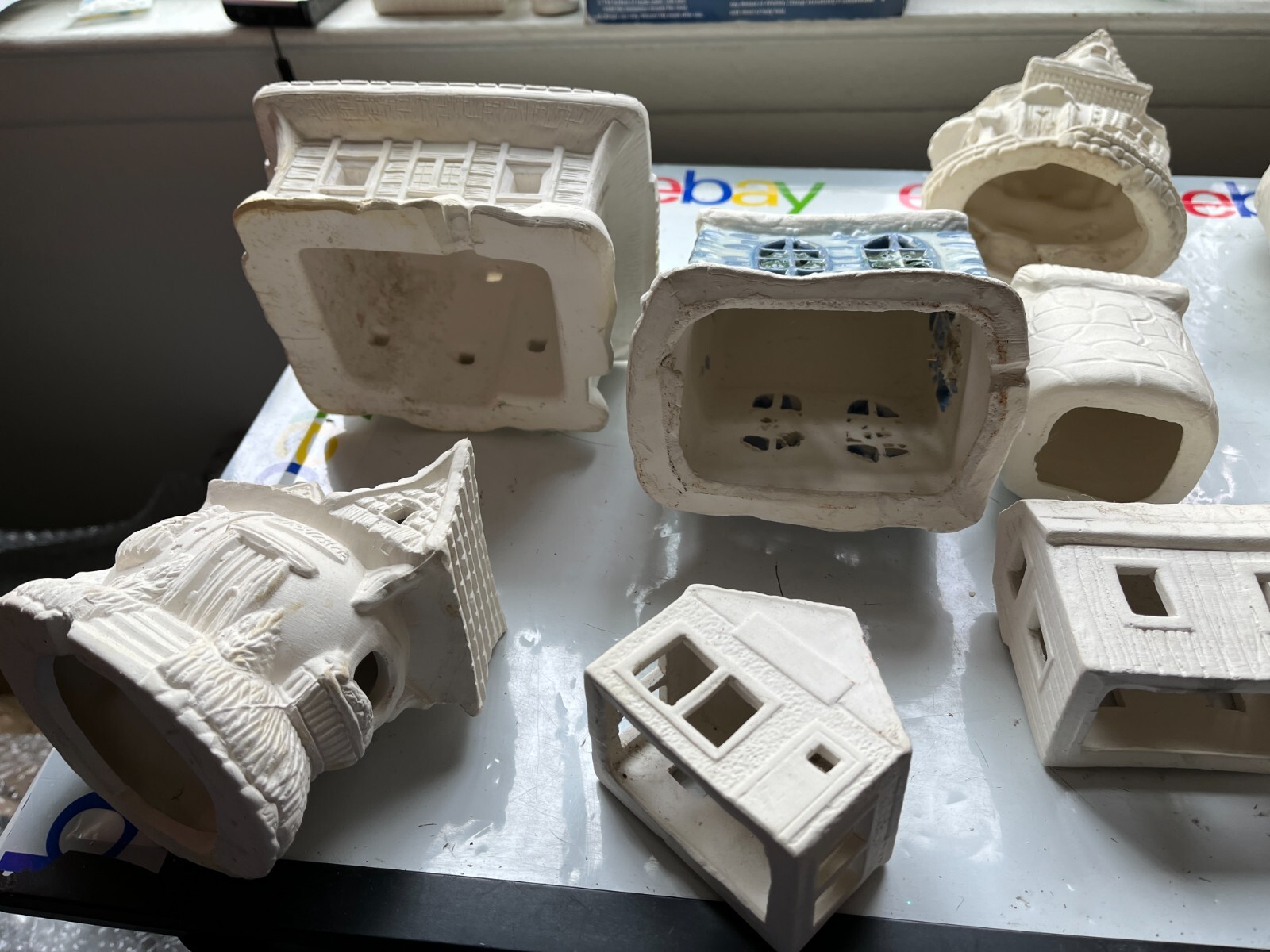 Lot of Ceramic Mostly Unpainted Figures Christmas Halloween Easter Village