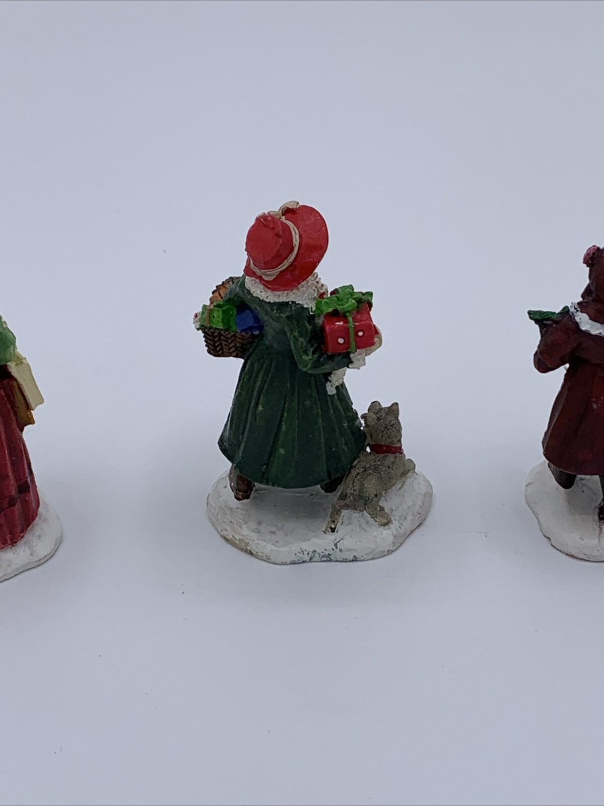 Lot of 3 Unbranded Christmas Village Figurines Tallest is 2.5 inches