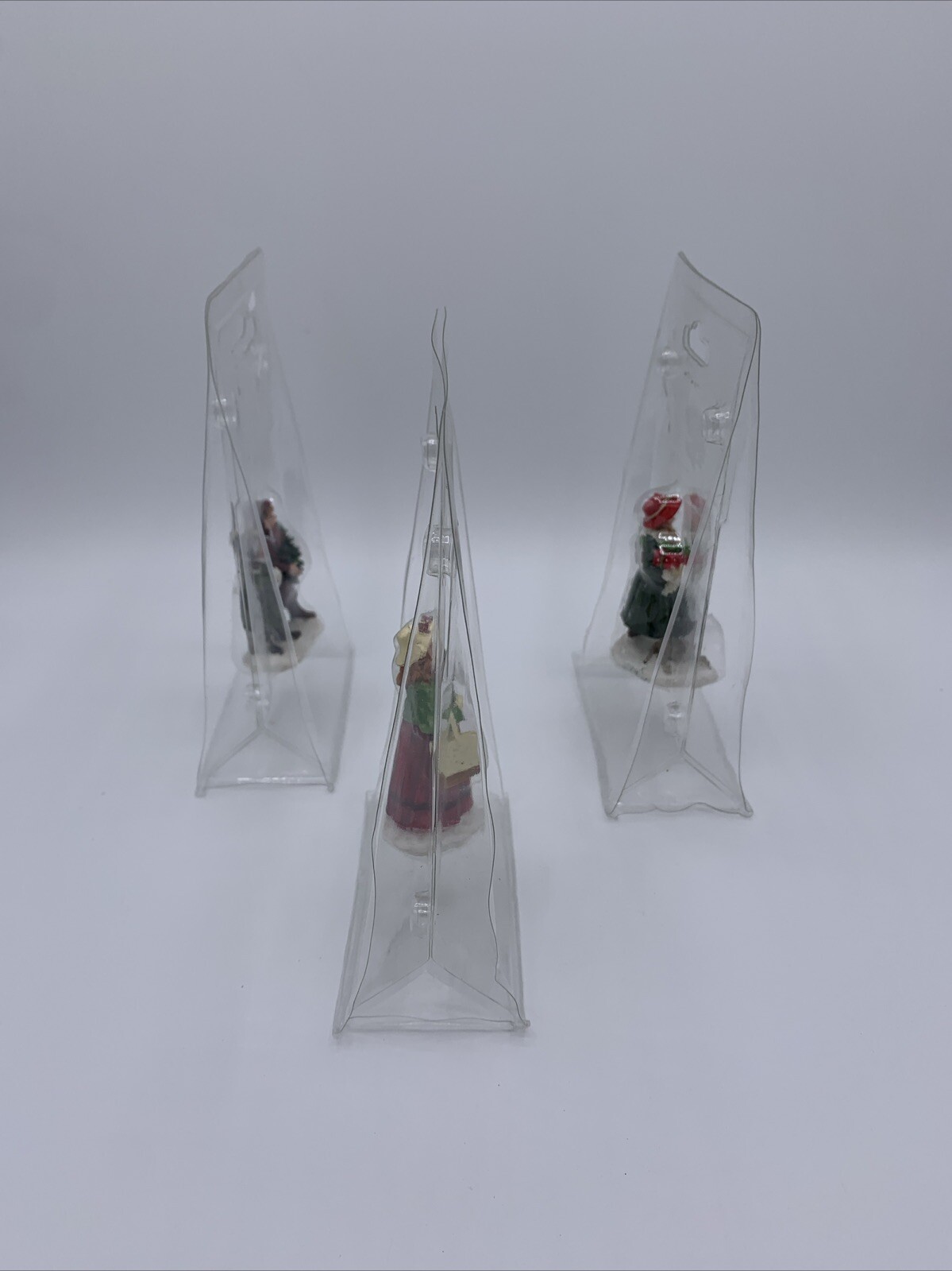 Lot of 3 Unbranded Christmas Village Figurines Tallest is 2.5 inches