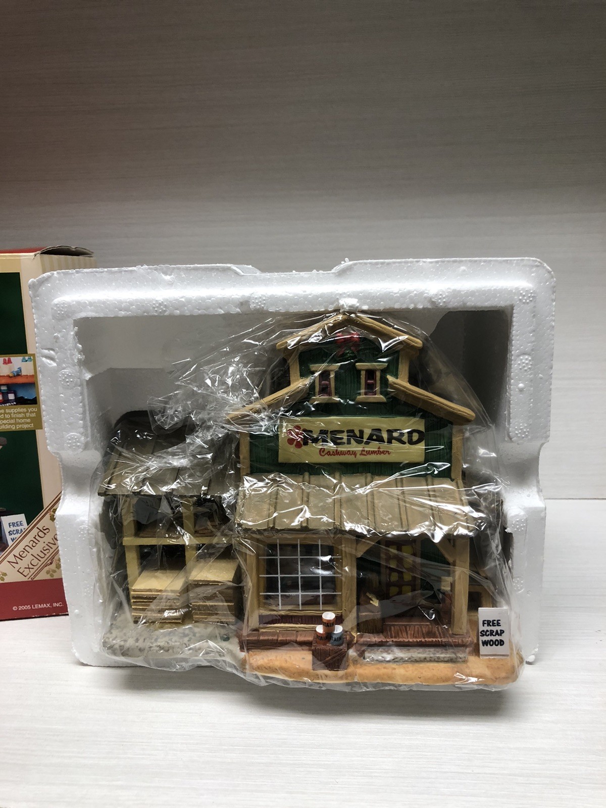 2005 LEMAX Harvest Crossing Lighted “MENARD CASHWAY LUMBER” #55325