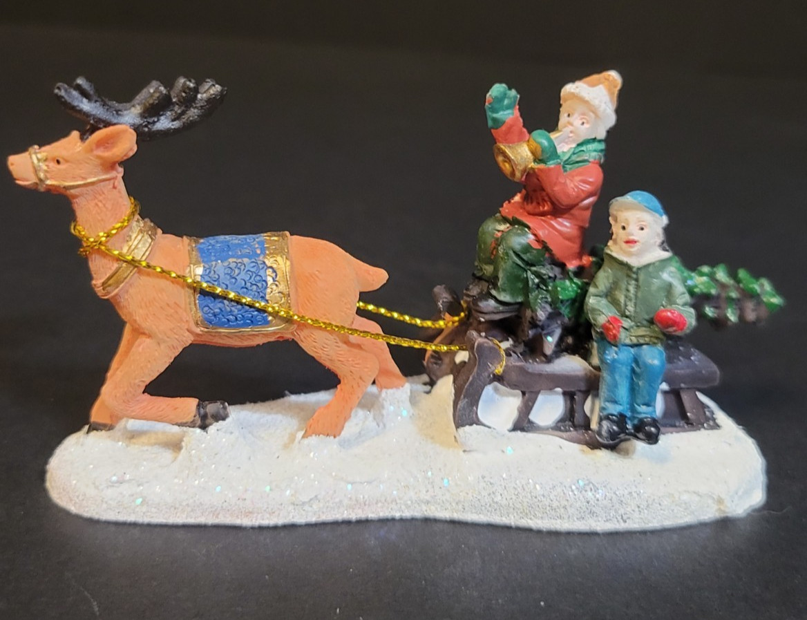 Holiday Time Santas Workbench Christmas Village Children On Sled With Reindeer
