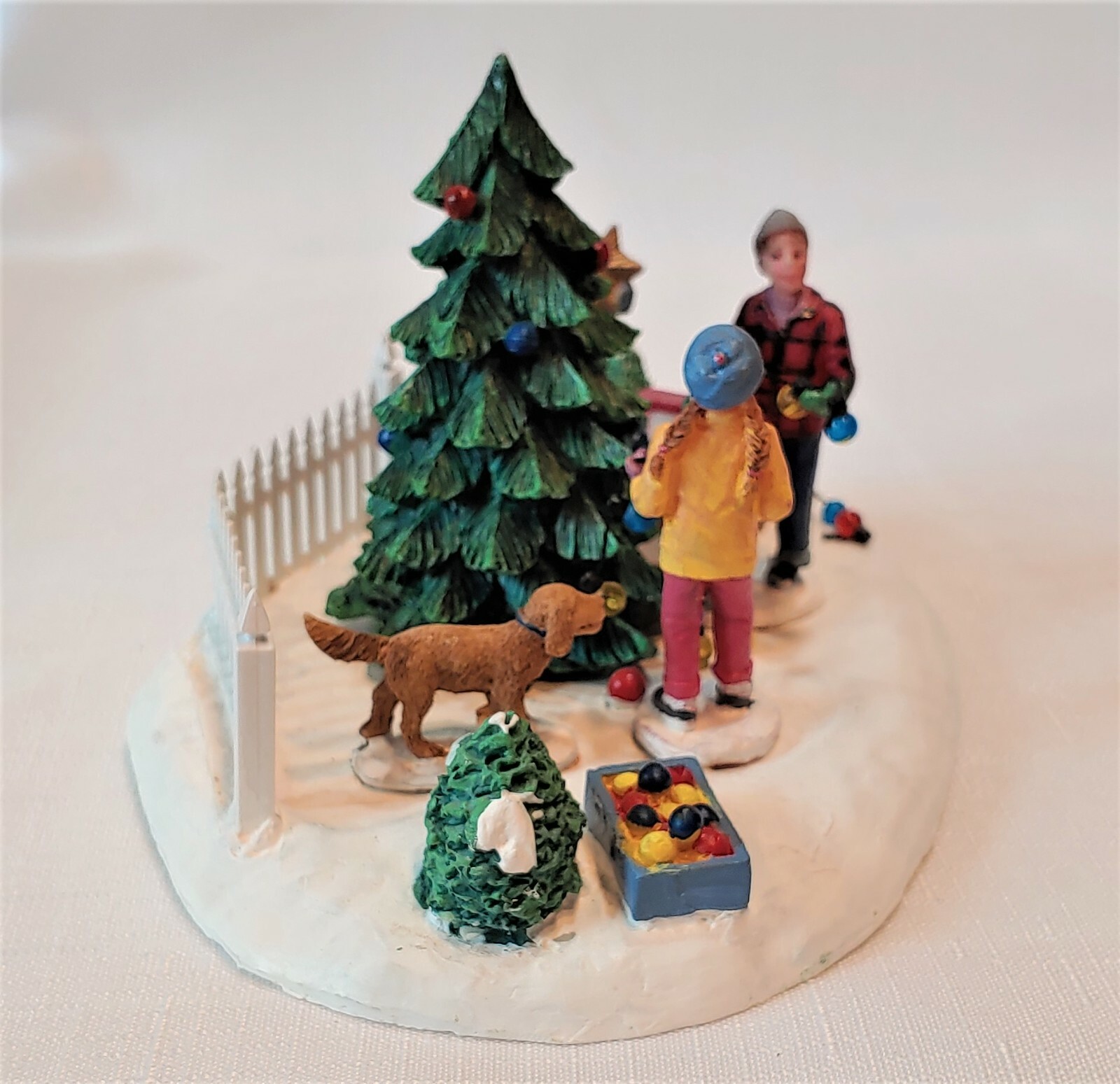 Christmas Village “Decorating The Tree”