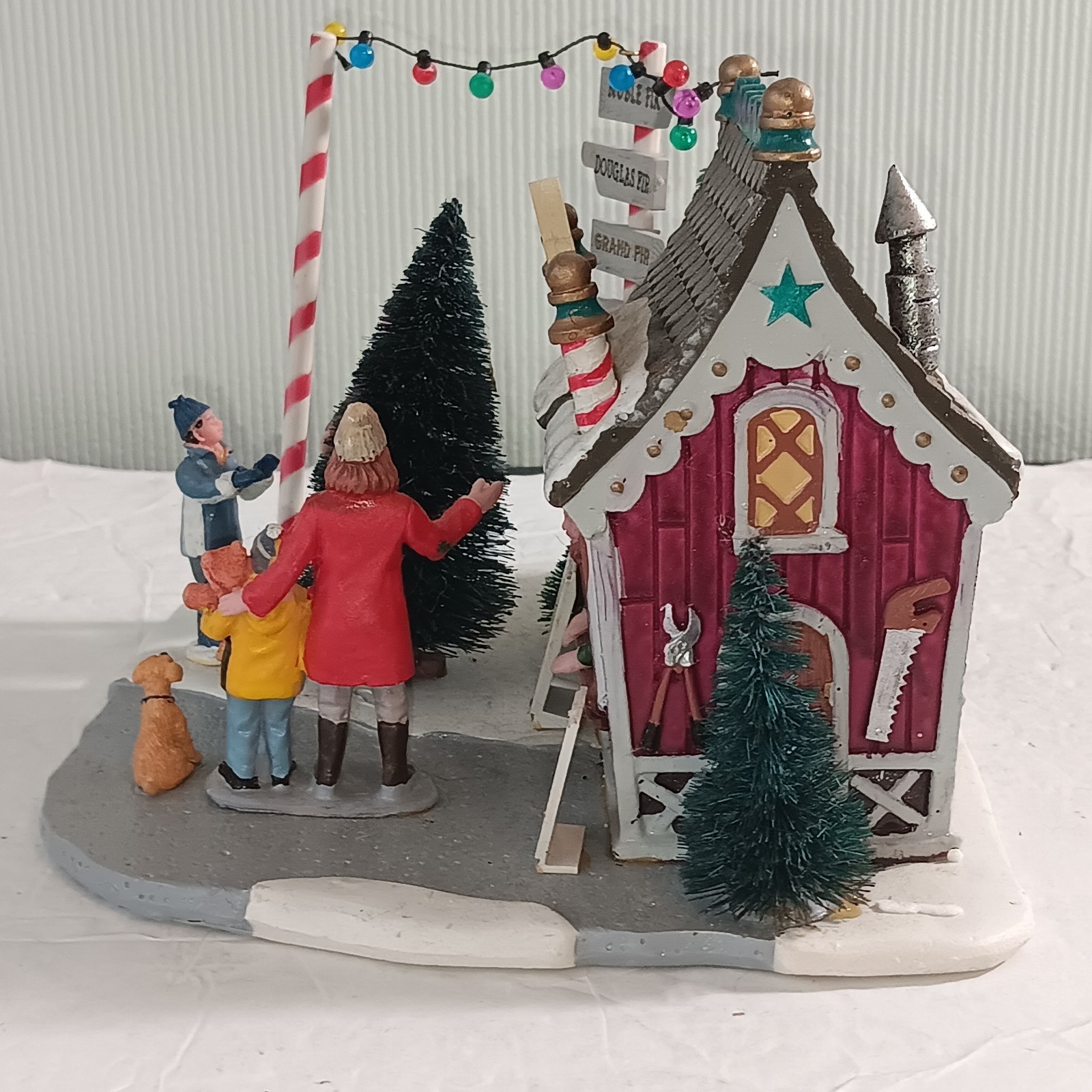 LEMAX St. Nicholas’s Tree Lot 3D Village Family Christmas Scene