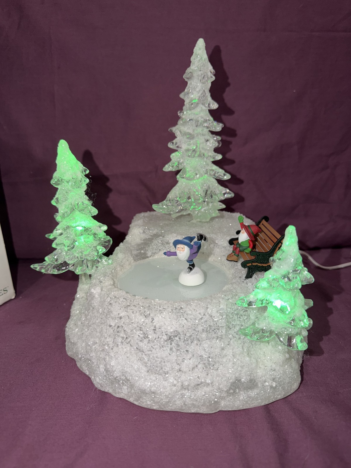 Department 56 Animated “Ice & Snow Skating Pond” Skater Bench