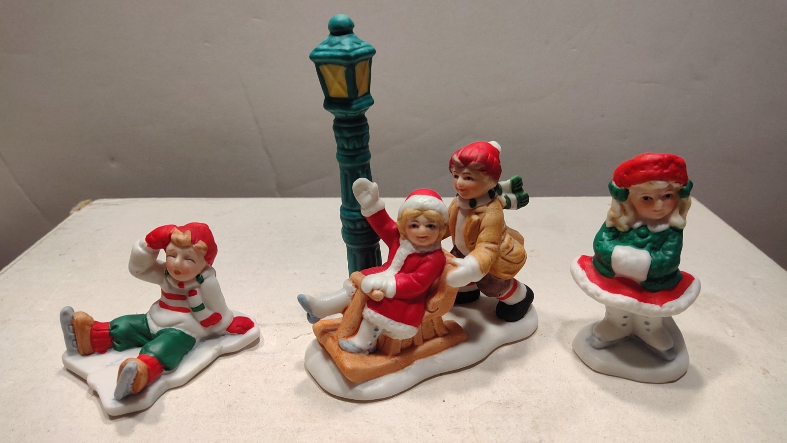 Group of 3 Lefton Colonial Village Figurines – Children Skating Sledding
