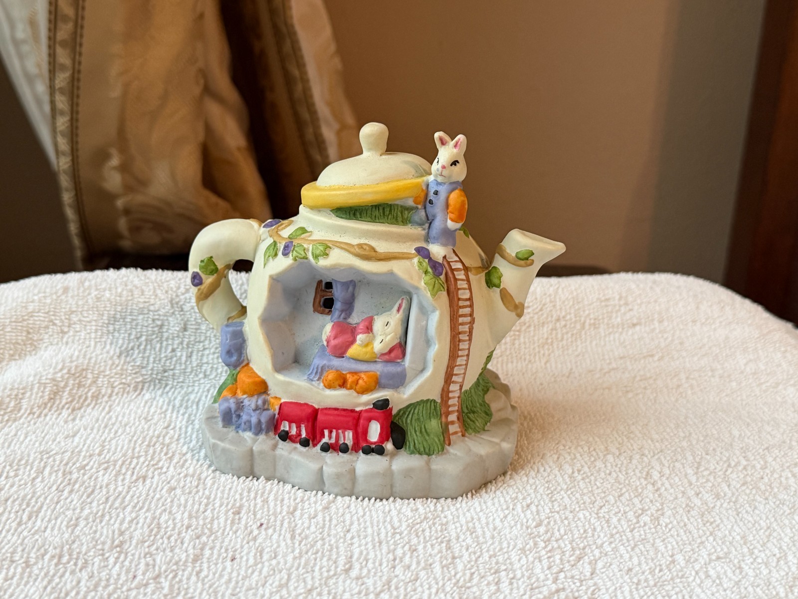 Easter village teapot shaped house rabbits on top and asleep in window MAX2560